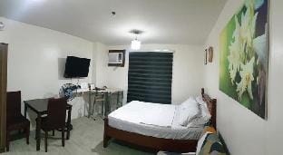 Cozy Unit w/Wifi+Netflix @Amaia behind Ayala Mall Vacation rental in Bacolod