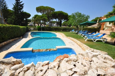 Set in good sized, mature gardens which afford a very good degree of privacy and Vacation rental in Quarteira