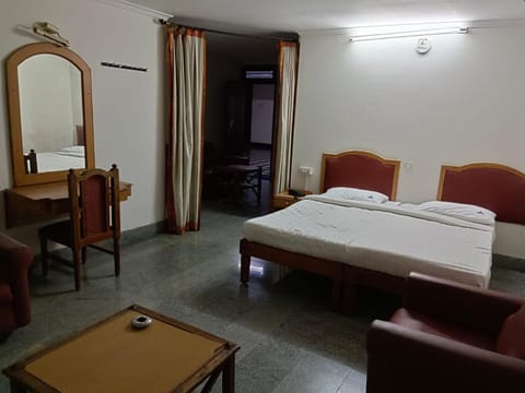 SPOT ON Hotel Karunadu Mysore Hotel in Mysuru