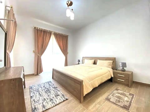 Super OYO 928 Home 436 Binghatti Mirage - 1Br, Jvc Vacation rental in Dubai