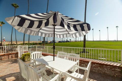 Outdoor patio right on the beach.