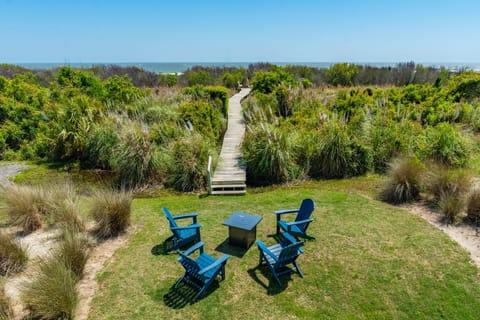 Private beach access may be limited by flooding. Alternative access is available via a shared boardwalk next door.