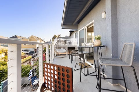 Open-concept kitchen, living, and dining area.