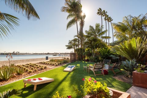 Play a game of cornhole and enjoy the ocean breeze on your private patio.