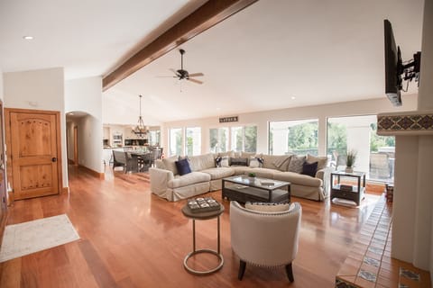 Naturally lit, spacious living room opens right up to the balcony.