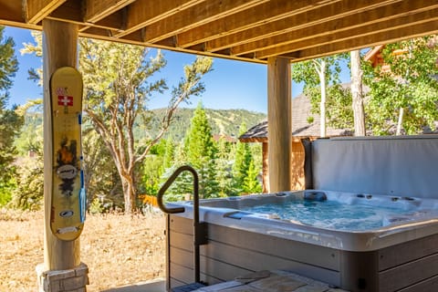 Hot tub with mountain views.