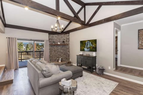 The living area features high ceilings.