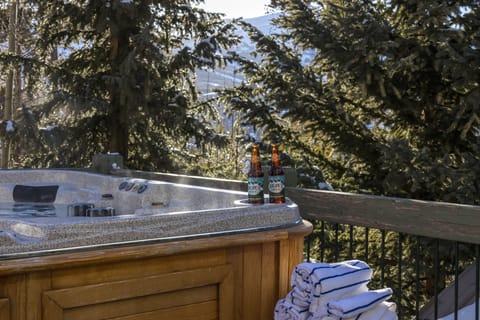 Hot tub in the trees.