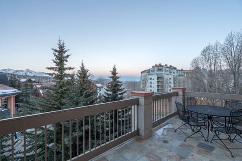 Balcony with village and mountain views.