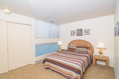 Primary bedroom features a queen bed.