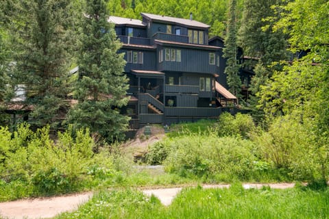 Charming residence nestled amidst nature's embrace, where tranquility and elegance harmonize.