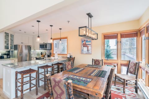 Warm dining area and kitchen.