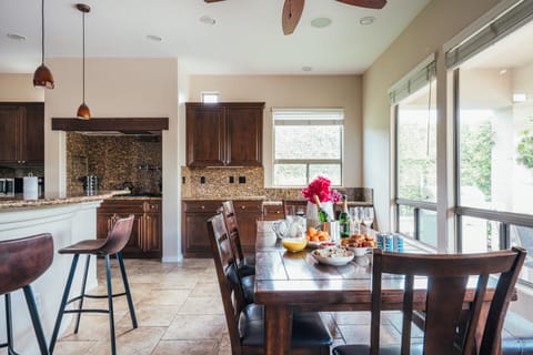 Opening dining and kitchen area.