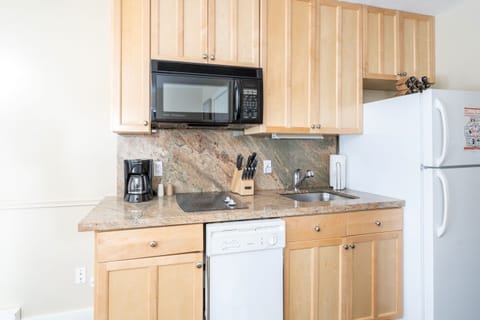 Primary bedroom features a queen bed.