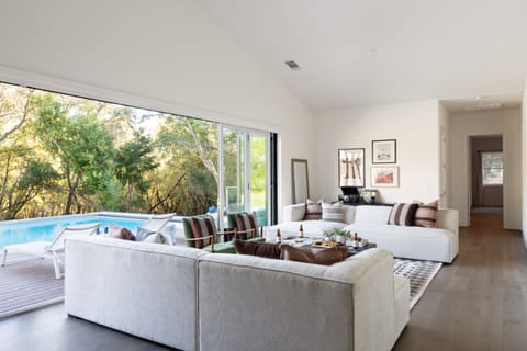 The family room opens up to the pool deck.