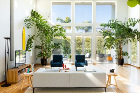 Sky high ceilings in the spacious living room.