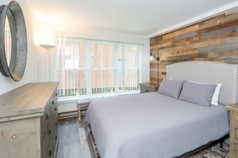 Primary bedroom features a queen bed.