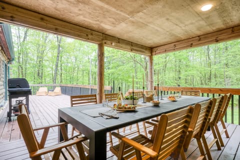 Outdoor grill and covered dining area.