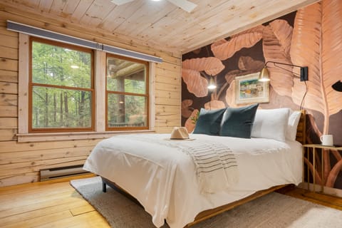 Bedroom 3 features a queen bed.