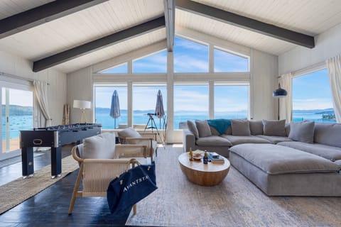 Living room with foosball, a telescope, and astonishing views.