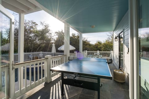 Ping pong by the pool.