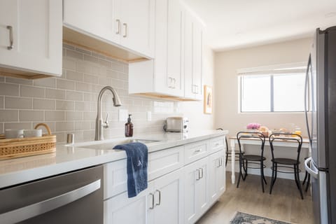 Kitchen features modern appliances.