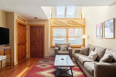 Cozy design with natural light form the large windows and skylight.