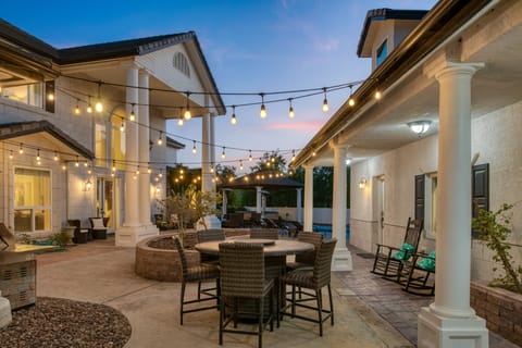 Spacious patio lights up at night.