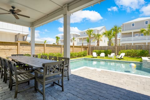 Dine al fresco under the covered deck, complete with a grilling and prep area.