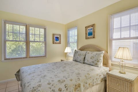 Primary bedroom features a queen bed.