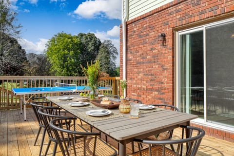 Outdoor dining table and ping-pong table.