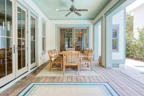 Outdoor dining area is perfect for al fresco poolside meals.