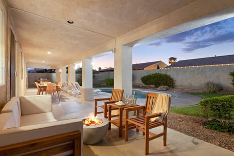 Dining area and kitchen with barstool seating.