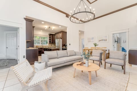 Open-concept design with a fireplace near the living and dining area.