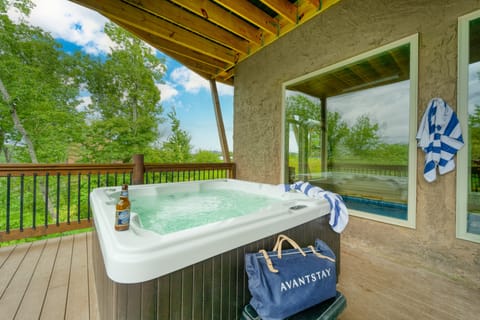 Hot tub with treetop views.