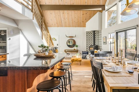 Additional barstool seating at the kitchen island.