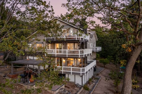 A huge home with multiple decks.