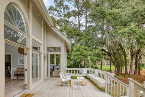 Large doors combine the patio with the living room and sunroom for incredible indoor/outdoor living.