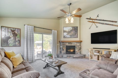 Cozy living room with a fireplace and TV — perfect for movie nights!