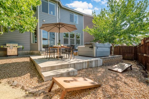 Spacious deck with an outdoor table and grill. Plus, cornhole is provided!