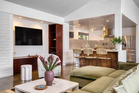 Living area opens to the kitchen.