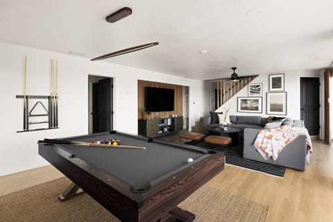 Cue up at the pool table in the rec room for a bit of friendly competition!