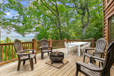 Warm kitchen with modern appliances and barstool seating at the island.