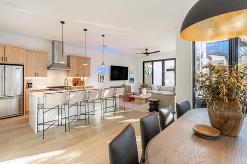 Bright living area with a large sectional.