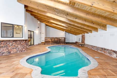 Welcome to Honeypot! Lakefront home with large indoor pool to enjoy a swim any time of the year.