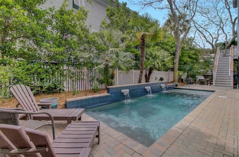 Relaxing pool with cascading waterfalls.