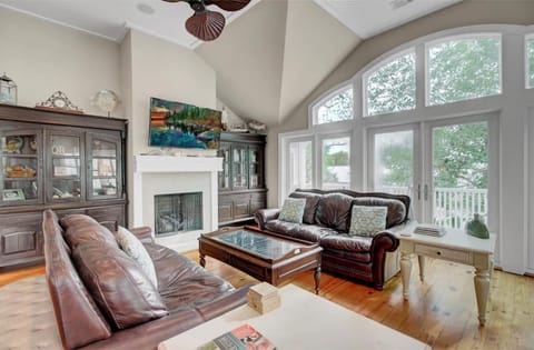 Gorgeous living area with windows galore.