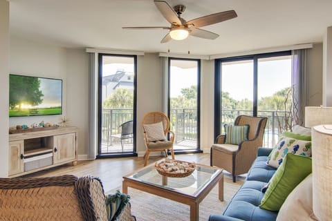 Living area with balcony access.