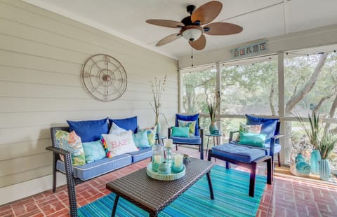 Screen porch with golf course views.