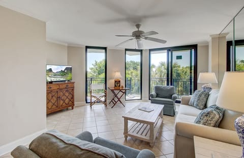 Living area with balcony access.